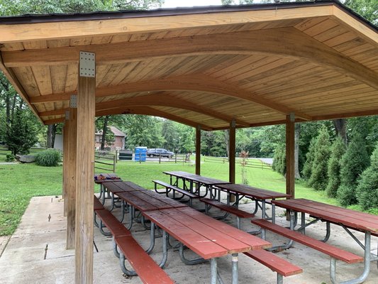 Large pavilion beside playground with small charcoal BBQ (not shown)