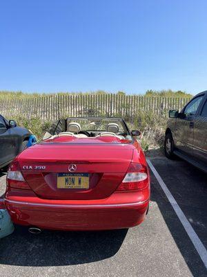 Car with roof fixed at the beach