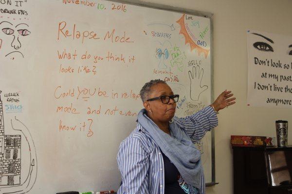 Counselor leading a class in the Adult Treatment Program