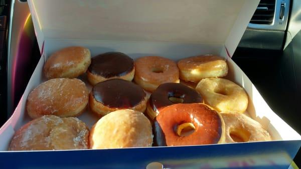 A dozen donuts and donut holes $6.