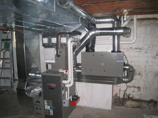 3 Zoned 98% gas furnace with AC and HRV system.