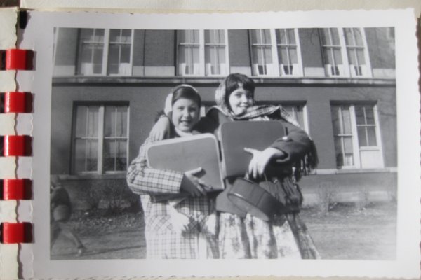 Me (left) with my friend Mary in front of Vanderpoel, 7th grade.