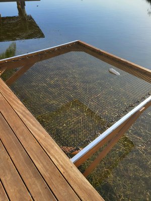 Air net over the lake to relax on summer days.