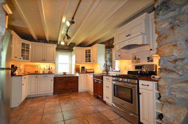 New kitchen we designed built and installed into an 1800's farmhouse.