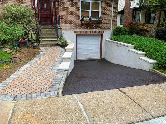 Beautiful nicolock walkway and driveway sealed.