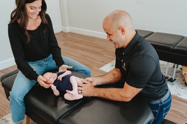 Infant Chiropractic Adjustment. The Adjustment helps restore balance to the nervous system and is specific, gentle and relaxing.