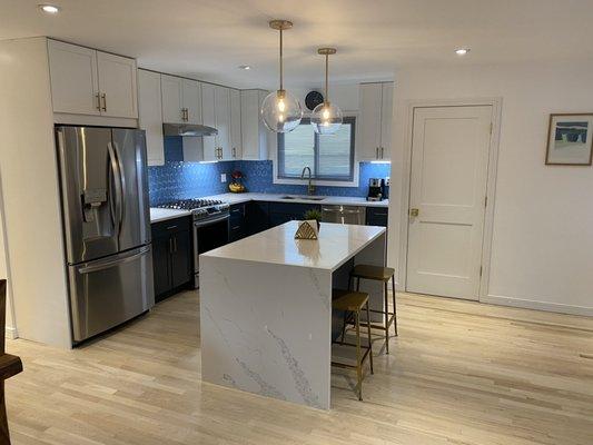 Kitchen remodel ,All new configuration, we added the island ,we remove the separation walls and we support the ceiling with Lvl Beam.