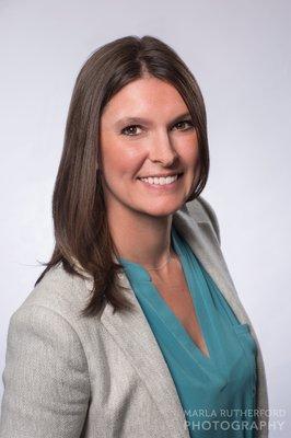 Business portrait photographed in the companies conference room. 23 headshots were photographed on the same day.