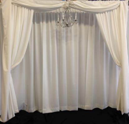 White Drape Arch Backdrop Rental