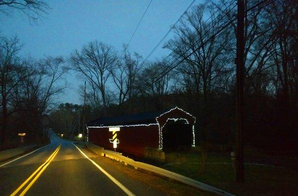 Bartram's Covered Bridge - with string lights, at night