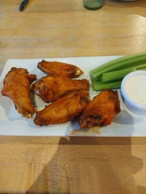 I ordered the Mild Wings, and they were great . They were done correctly with a slight crisp . They were meaty and juicy and delicious.