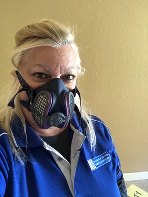 Suited with PPE with a P-100 respirator.  Took off safety goggles for this photo.