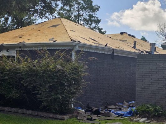 Roofing contractor work in progress ashpalt roof