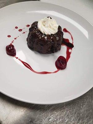 Molten chocolate cake w/ Port wine infused cherries.