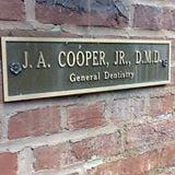 Cooper John A Jr DMD logo