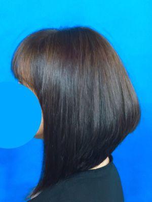 Stacked A Line bob with multi-dimensional Burnett kissed with golds and coppers