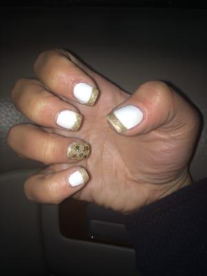 Gold and white French manicure gel nails with gold glitter accent nail