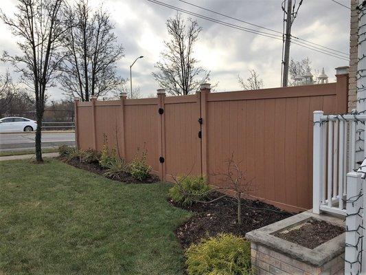 Classic Vinyl Fence - Mocha Wood Grain Fence