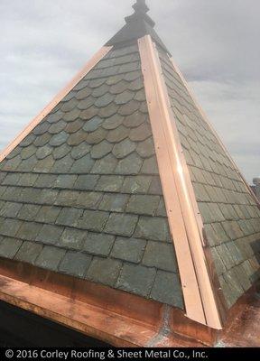 A Del Carmen slate turret with copper accents we installed in Washington, DC