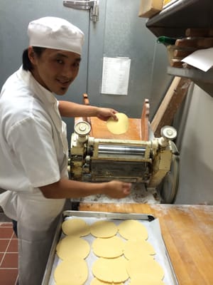 Chef Teng is preparing the dough for the tart shells.