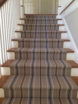 A beautiful stripe wool piece installed as a bound runner.