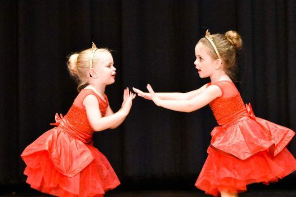 Sweet sisters dancing their hearts out!