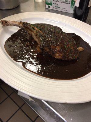 Tomahawk ribeye steak with bordelaise sauce