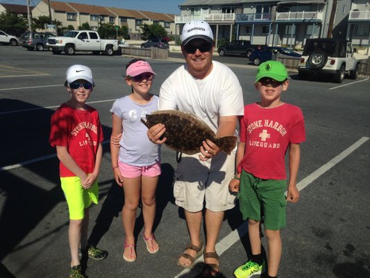 Captain Mike and the kids fishing