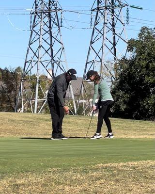 Caddying for one of my prime students.