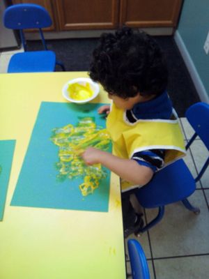 Toddlers use art expression during their art class time