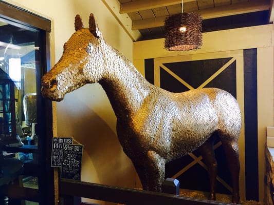 Penny the horse located in the entry area.