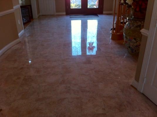 Marble restoration of residential foyer.