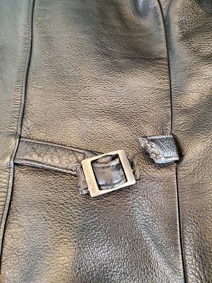 Leather Jacket strap chewed by a dog. Can you repair?