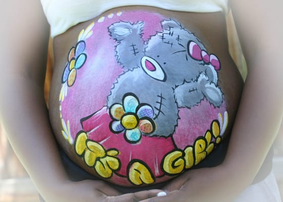 Prenatal Belly painting of gender announcement