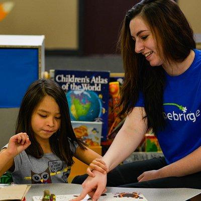 An RBT working with a kiddo during 1 on 1 ABA therapy.