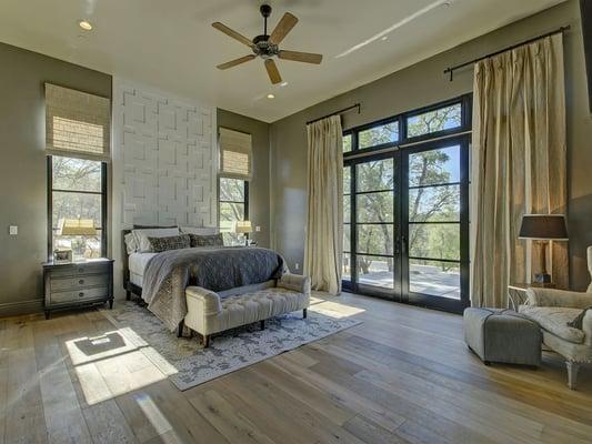 Bedroom of the El Dorado custom home. This home has a very unique design and brings peace and calm to the homeowners.