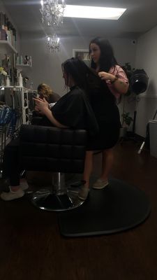 Ashtons is blow drying my daughters hair and going over the styles she wants