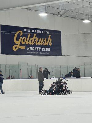 Goalie hug