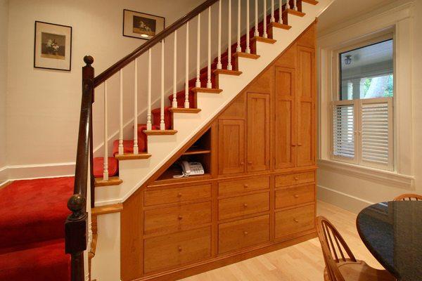 Custom under the stairs storage area.