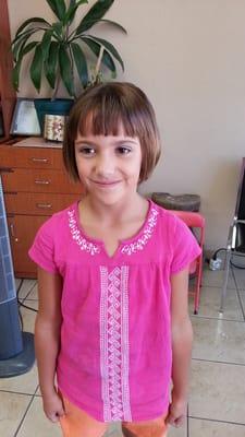 My granddaughter, het bowl cut saved by Alex's mama. My baby was do happy!