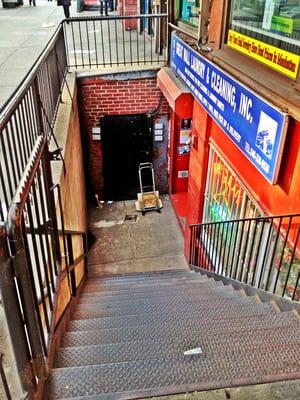 Entrance staircase from sidewalk to basement