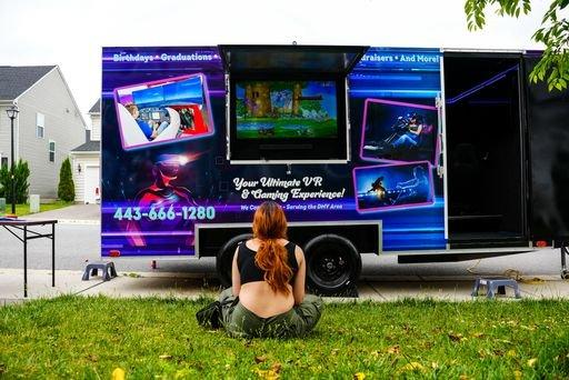 Customer Enjoying The Outside TV Fun. That Can Allow up to 8 players at once!!