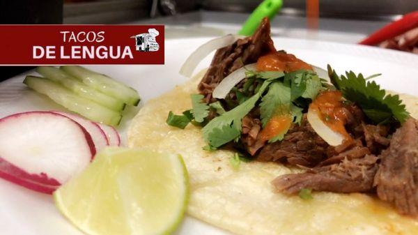 Authentic Mexican tongue(lengua) Tacos with cilantro onion fresh lemon and salsa roja on the side