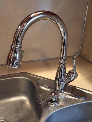 Delta Leland model faucet, with matching soap dispenser