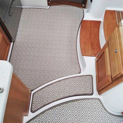 Here's a beautiful boat job! Custom woven vinyl templated and bound by our master installer Jody Tucker.