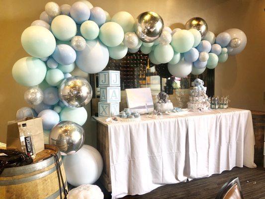 Baby shower balloon arch.