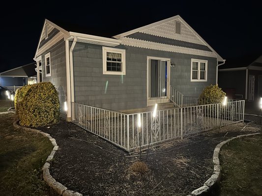 This Village Green client in Cape May chose whimsical landscape lighting to accent their home.