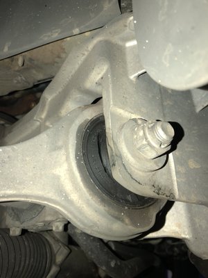 Mercedes C230, torn thrust arm causing clunk when braking