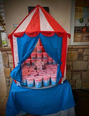 Decorations are included in your service price. We go "over the top" in service. 
Patriotic cotton candy containers.