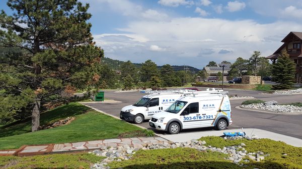 Both Peak Window Cleaning vans out on the job